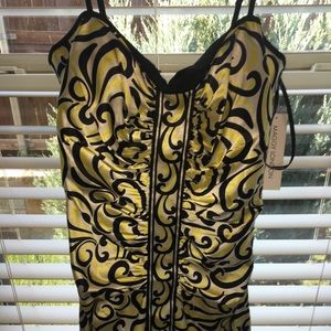 Yellow black and cream party dress